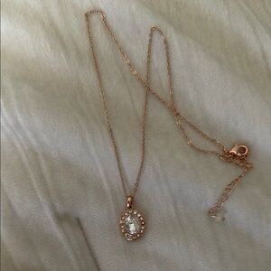 Elegant Gold Necklace with Crystal Pendant